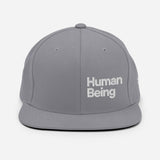 HUMAN BEING Snapback Hat